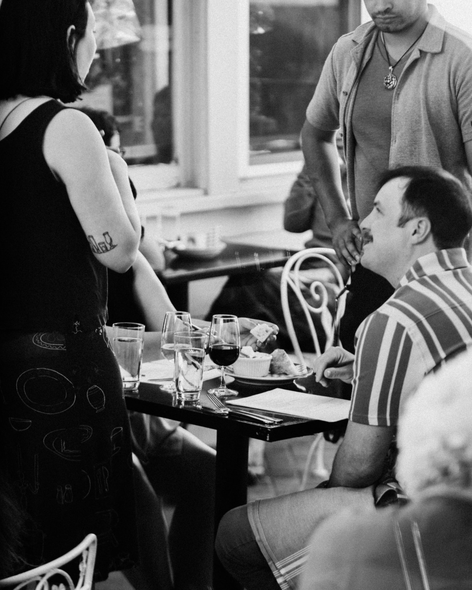 A table sharing wine and antipasti during a Nana's dinner pop-up